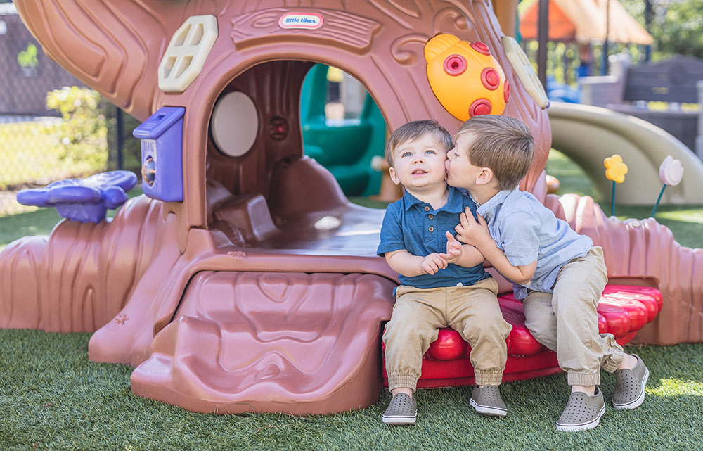 happy boys playing outdoors at a Preschool & Daycare Serving Conway & Myrtle Beach, SC