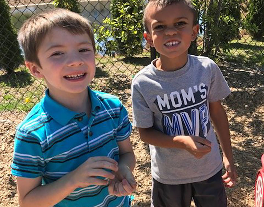 two preschool boys smiling outside at a Preschool & Daycare Serving Conway & Myrtle Beach, SC